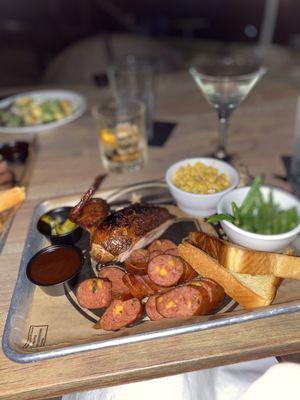 Smoked chicken, jalapeño cheddar sausage, sautéed green beans & elote