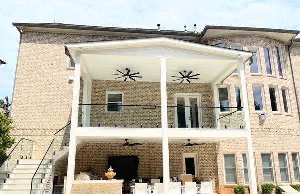 Spigot Mounted Glass with Top Cap in a Matte Black Finish.