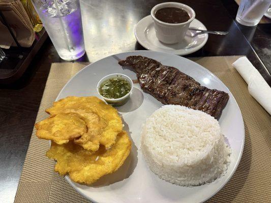 Churrasco with black beans and rice and tostones