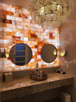 Mirrors in the bathroom with complimentary toiletries