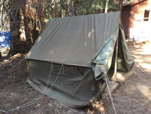 Worn out tents with holes in them.