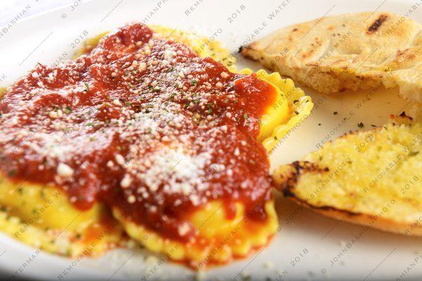 Delicious sauce on Cheese Ravioli and Lepinja