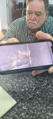 That's the picture the guy showed me that was in the car. It's not the best quality because it was behind the plastic partition.