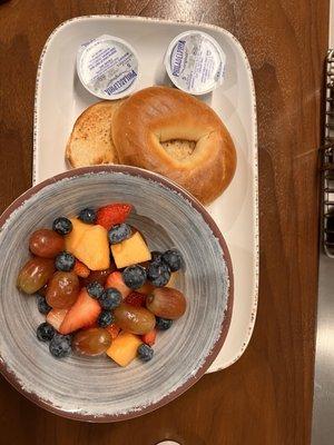 Bagel n cream cheese and fruit bowl