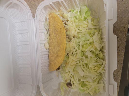 Taco with fresh lettuce
