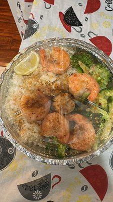 Grilled shrimp and scallops with broccoli and rice