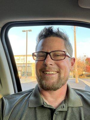 This is me, in my truck, in front of the shop following my first cut there.