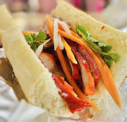 1/2 Chinese BBQ "Bahn mì" moi fave Chinese BBQ Pork Sandwich is here. OuiOui (Sorry I ate half b4 photo)