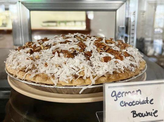 Homemade German Chocolate Brownie Pie. Whole pies available - Order one day in advance.
