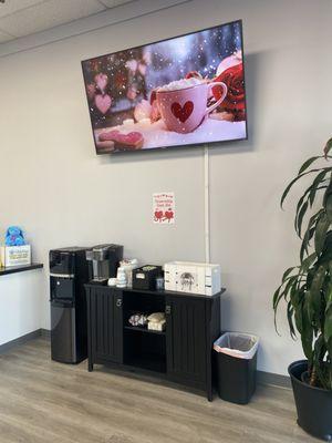 Complimentary snack bar with coffee, tea, and water.