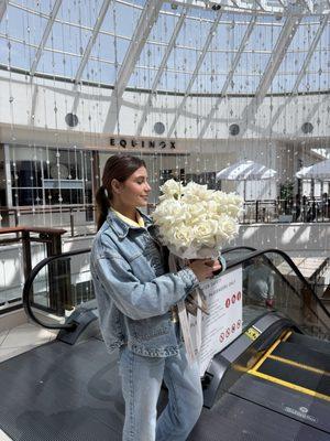 A bouquet of roses in a basket