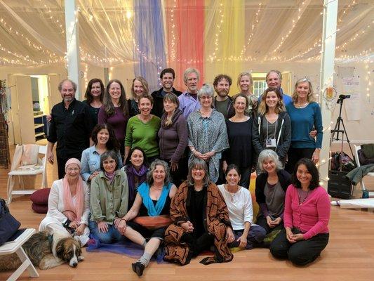 I'm on the left in white with pink scarf and my service dog, Winston. This is some of the Core Individuation community.