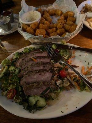Mai Thai salad and Cajun tots.