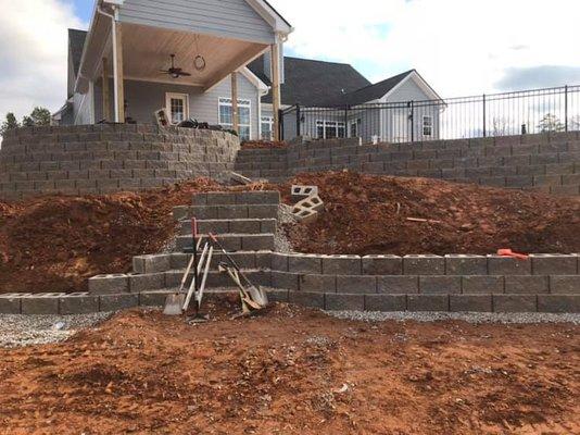 Retaining wall and stairs under construction