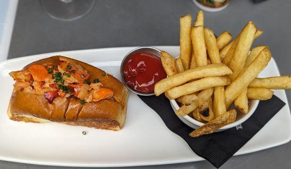 Classic Hot Lobster Roll**  (served with choice of salad, house chips or fries) $35