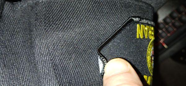 The patch is glued on and not sewn on to an extremely cheap made hat......