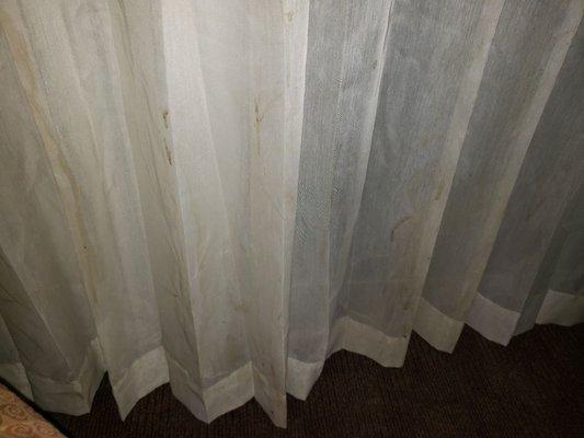 These are curtains that have stuff just running down them