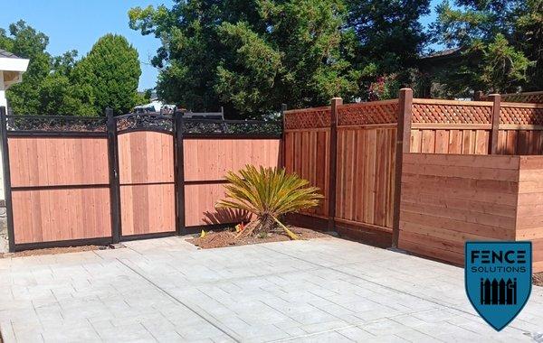 Redwood fence installation by Fence Solutions!