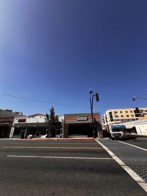 Facade of the place, we are located in downtown Bellflower, with parking availability.