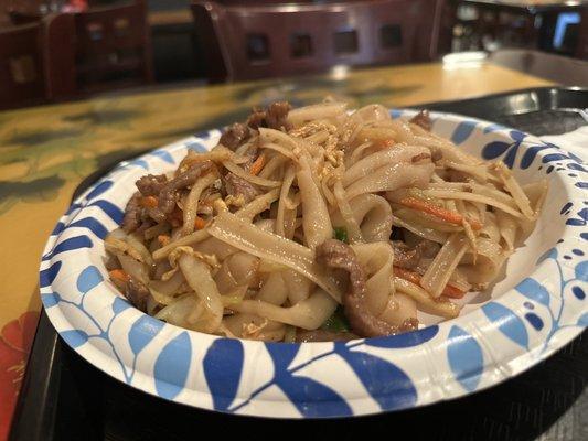 Chow fun or Ho fun noodles with beef, it's rice noodles stir fried with soy sauce with vegetables and a protein