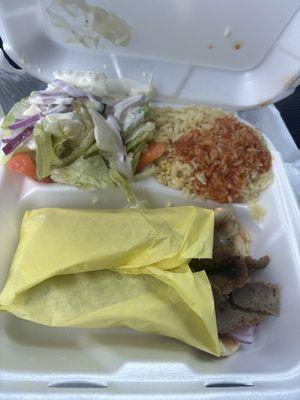 The gyro plate with salad and rice .Quick delivery through drive thru.