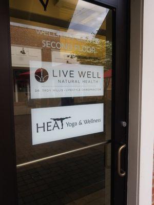 Enter here and go upatairs to find this lil hot yoga oasis