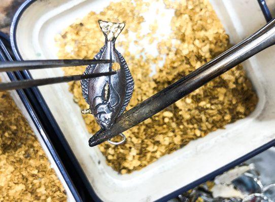 Overlaying Alaskan Gold Nuggets into a Halibut silver pendant!