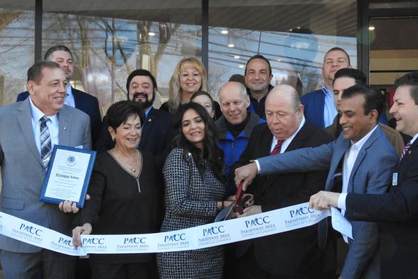 ParsippanyvMayor James Barberio; Parsippany Economic Development Chairman Frank Cahill cut the ribbon celebrating the new location