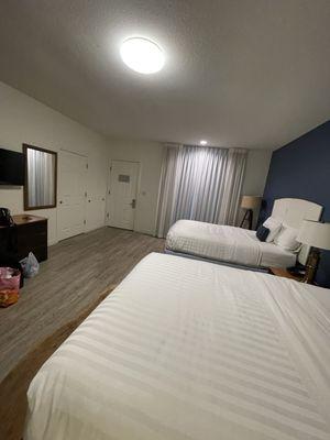 From the restroom view, you can see how big the room is with 2 queen beds.