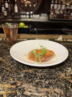 Free drink and bite at happy hour! I really liked that little toast!