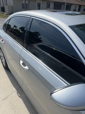 VW Passat 5% in the back and 15% in the front. Still pretty dark but I like it.