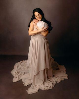 Here at Madison Grey Photography, we specialize in newborn, milestone, maternity, and family in our studio and on location. Call today!