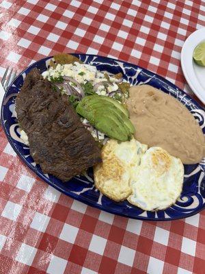 Chilaquiles verdes add asada