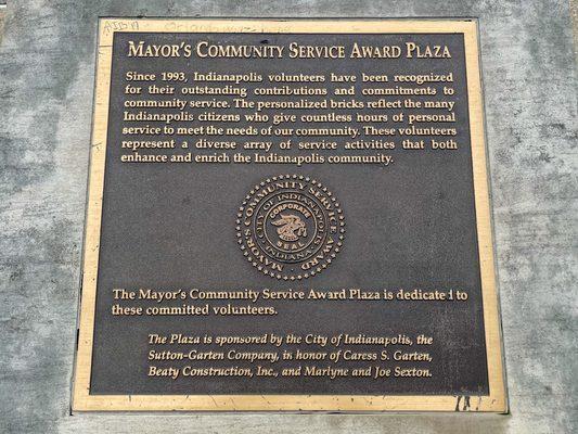Plaque honoring Community Service Award Plaza