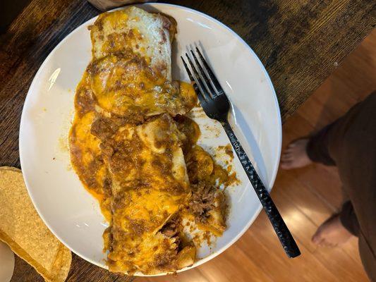 To go order chili burrito. After struggling to get it out of the tiny pan they stuffed it into.