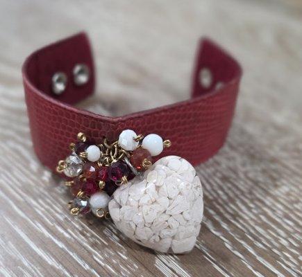 This bracelet has stones excavated from historic mines in Mexico. It is also 100% real leather with two separate buttons for adjustability.