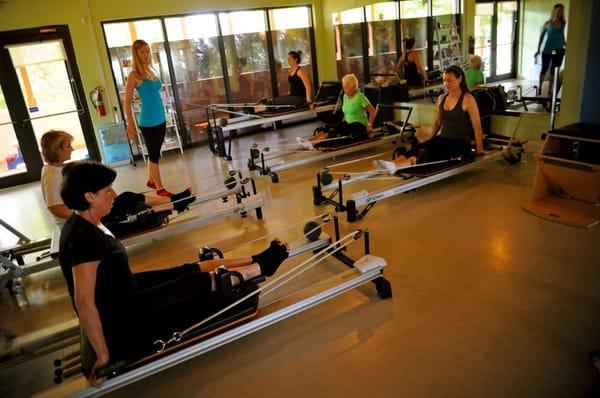 Group Pilates Reformer class.