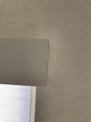 You can tell that the wood looks worn and the white is discolored