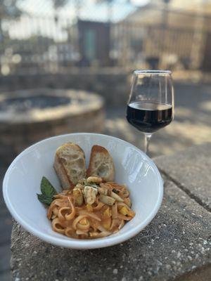 Scallop fettuccine with Roma vodka sauce and squash