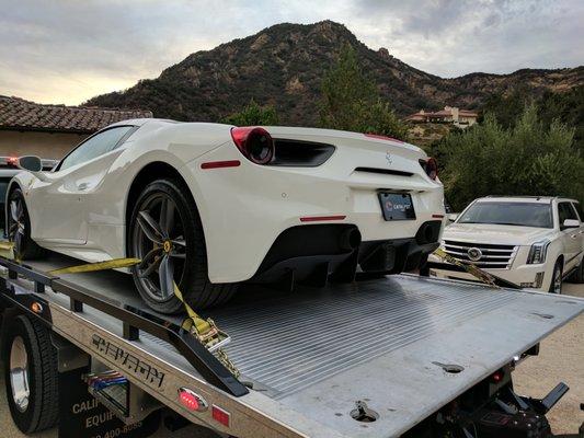 2017 Ferrari 488 Spider about to be unloaded at a clients house.