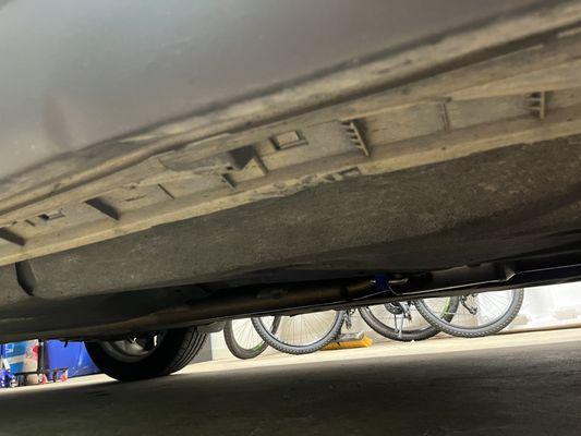 passenger side pinch weld compressed in