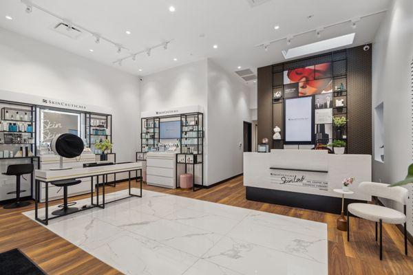 Interior receptionist area for SkinCeuticals SkinLab™ Denver by The Center for Cosmetic Surgery