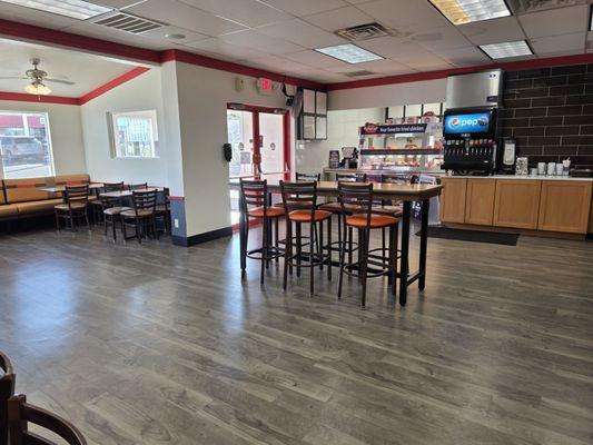 Krispy Krumchy Chicken dining area. Cashier by door. Booth seating along walls
