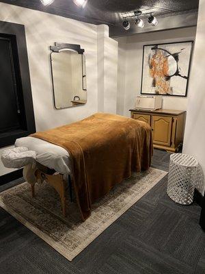 One of our stylish & welcoming massage/service rooms