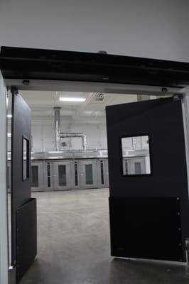 Swinging Warehouse Traffic Doors. High Impact Doors for warehouses. Made in the US