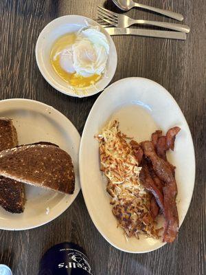 Eggs bacon hash browns and toast