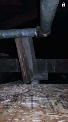 They disconnected the piping and left it on a wooden block.