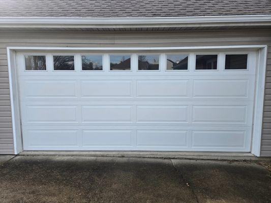 New residential garage door installation completed with precision, clean workmanship, and smooth, quiet operation.