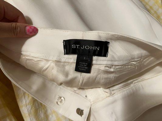 So many loose threads and the tag was stitched with the wrong color thread, in the wrong place