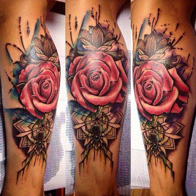 Tattoo by Tonii Florrez, watercolor style rose with black widow and henna background